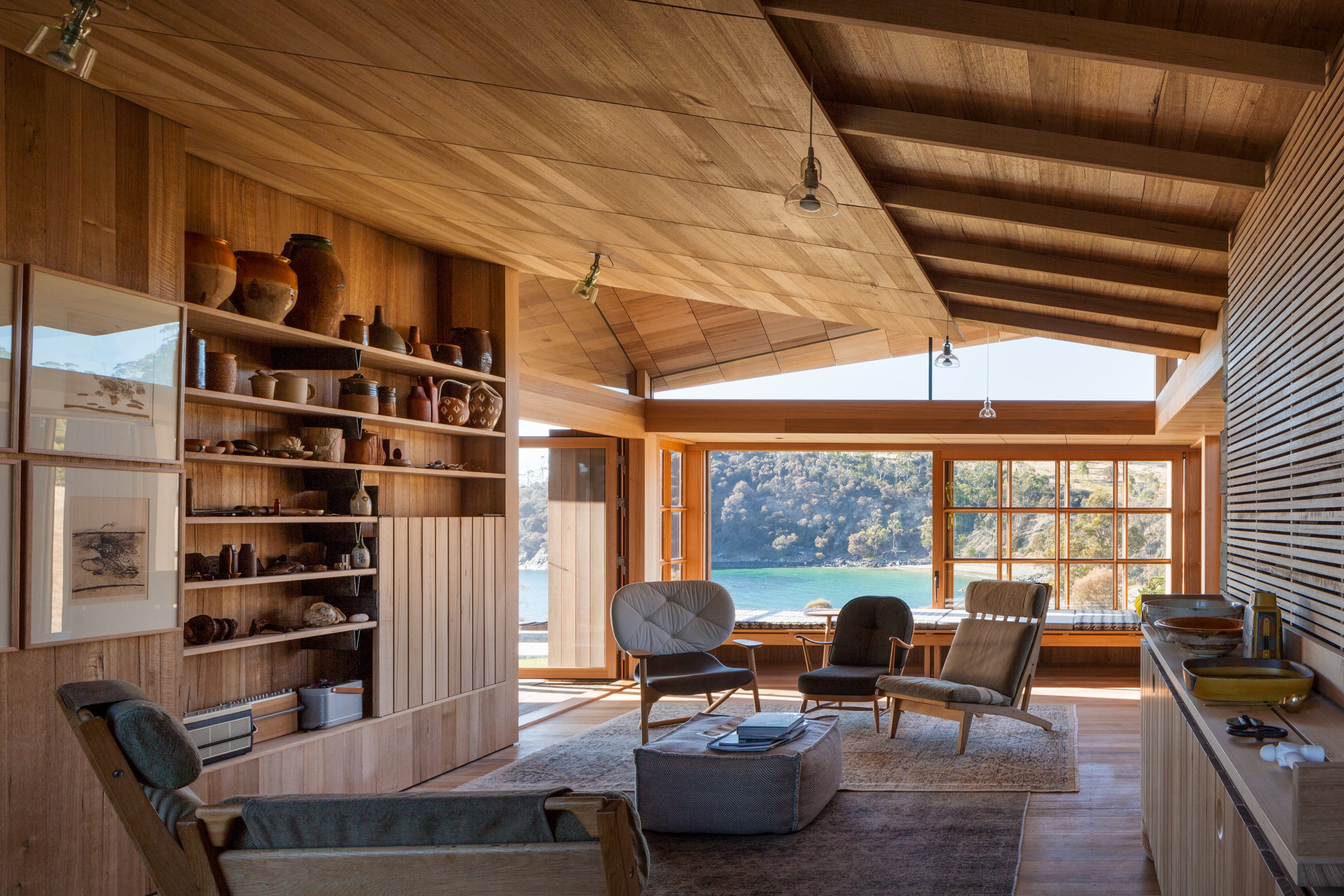 The Raised Roof Plane And Expanse Of Timber Shutters Disrupt This Elevation Of The Traditional 1830s Weatherboard Home.