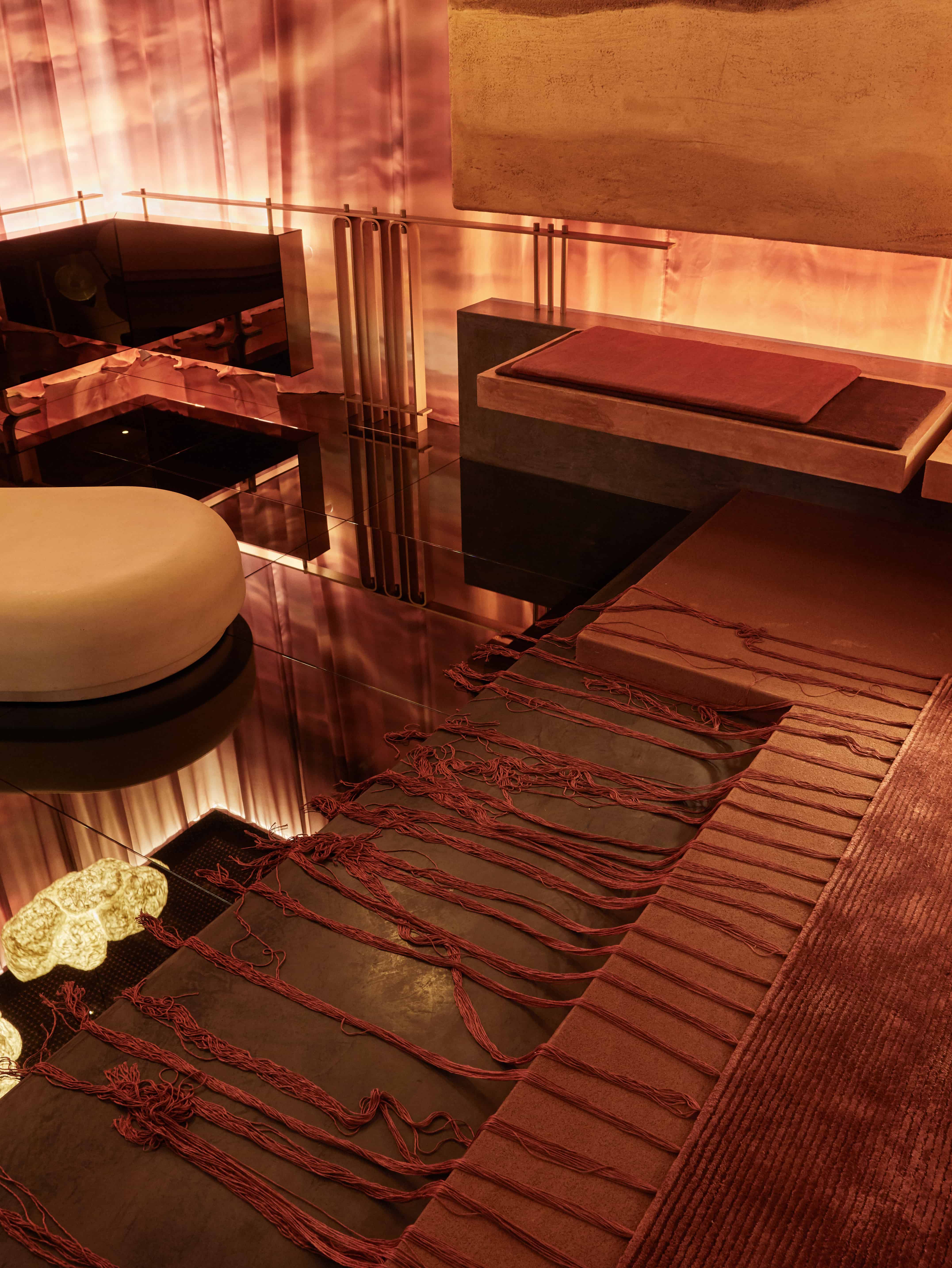 The Space Is A Series Of Contrasts, Earthy And Ground Like Elements.