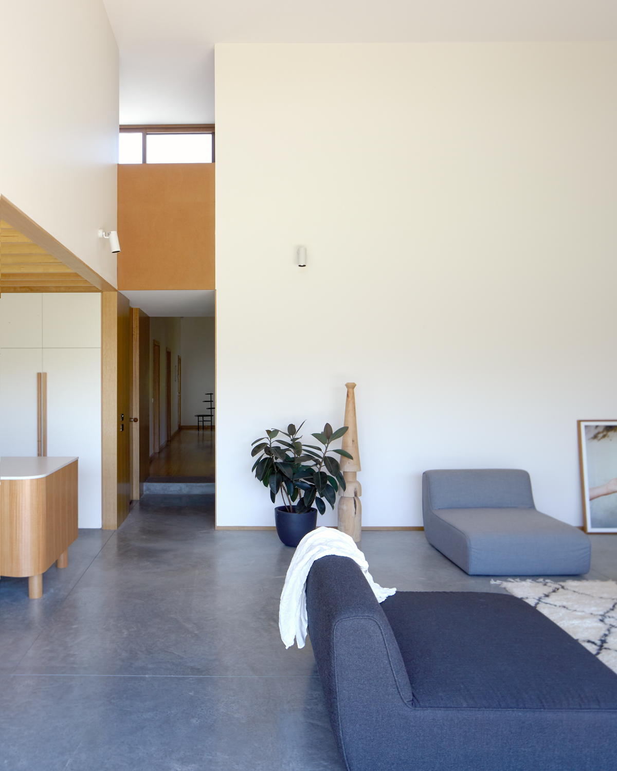 The Concrete Floor Was A Passive Design Element Where Functionality Mediates The Temperature Of The House.