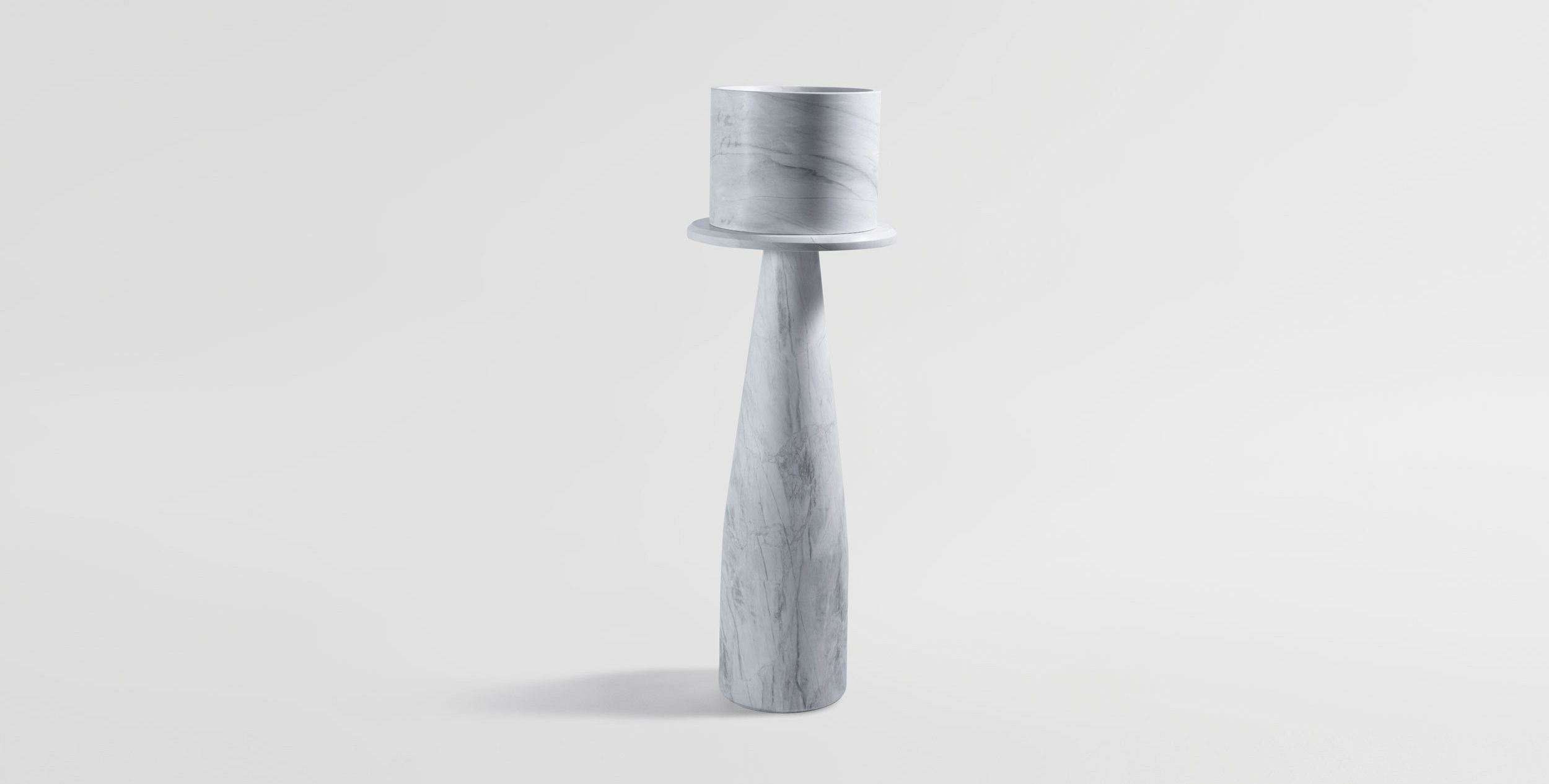 Comprised Of Pedestal And Planter, These Cylindrical Forms Are Designed With Minimal Design Language To Allow The Solid Elba Stone To Be The Focus.