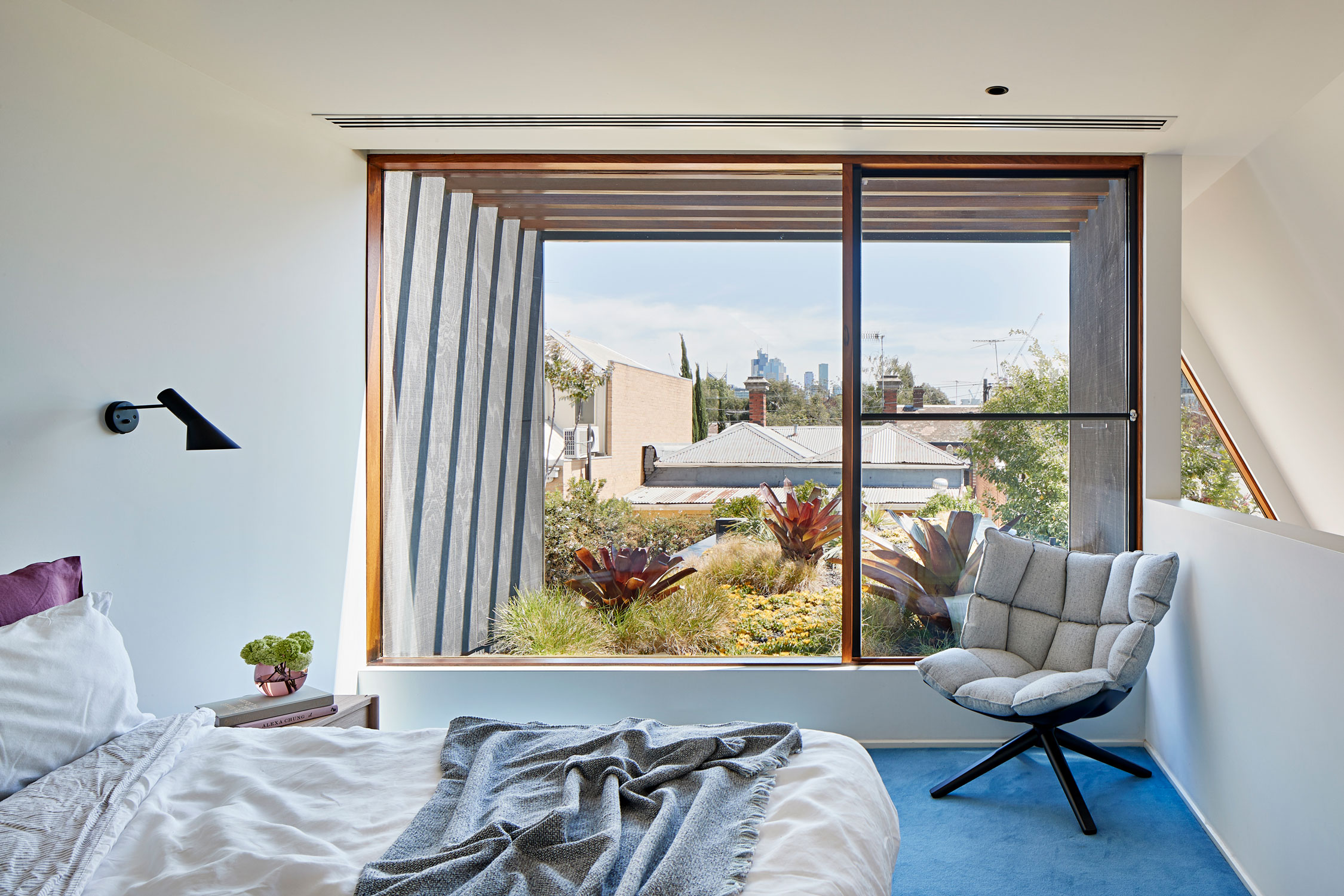 Through The Careful Insertion Of Only Two Courtyards, Space Is Intermittently Intertwined And Borrowed From One Zone To Another