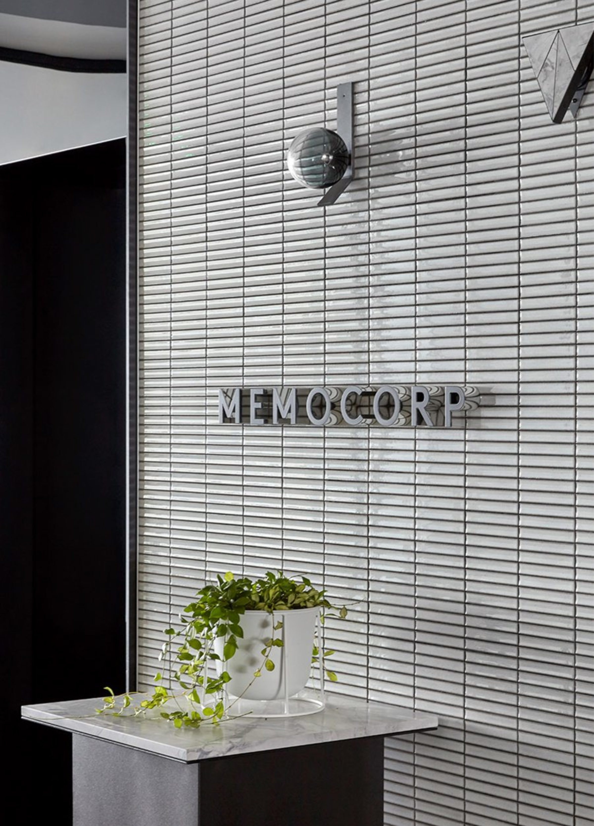 The Custom Designed Reception Desk In The Memocorp Office Allows The Artedomus White Fantasy Stone To Shine.