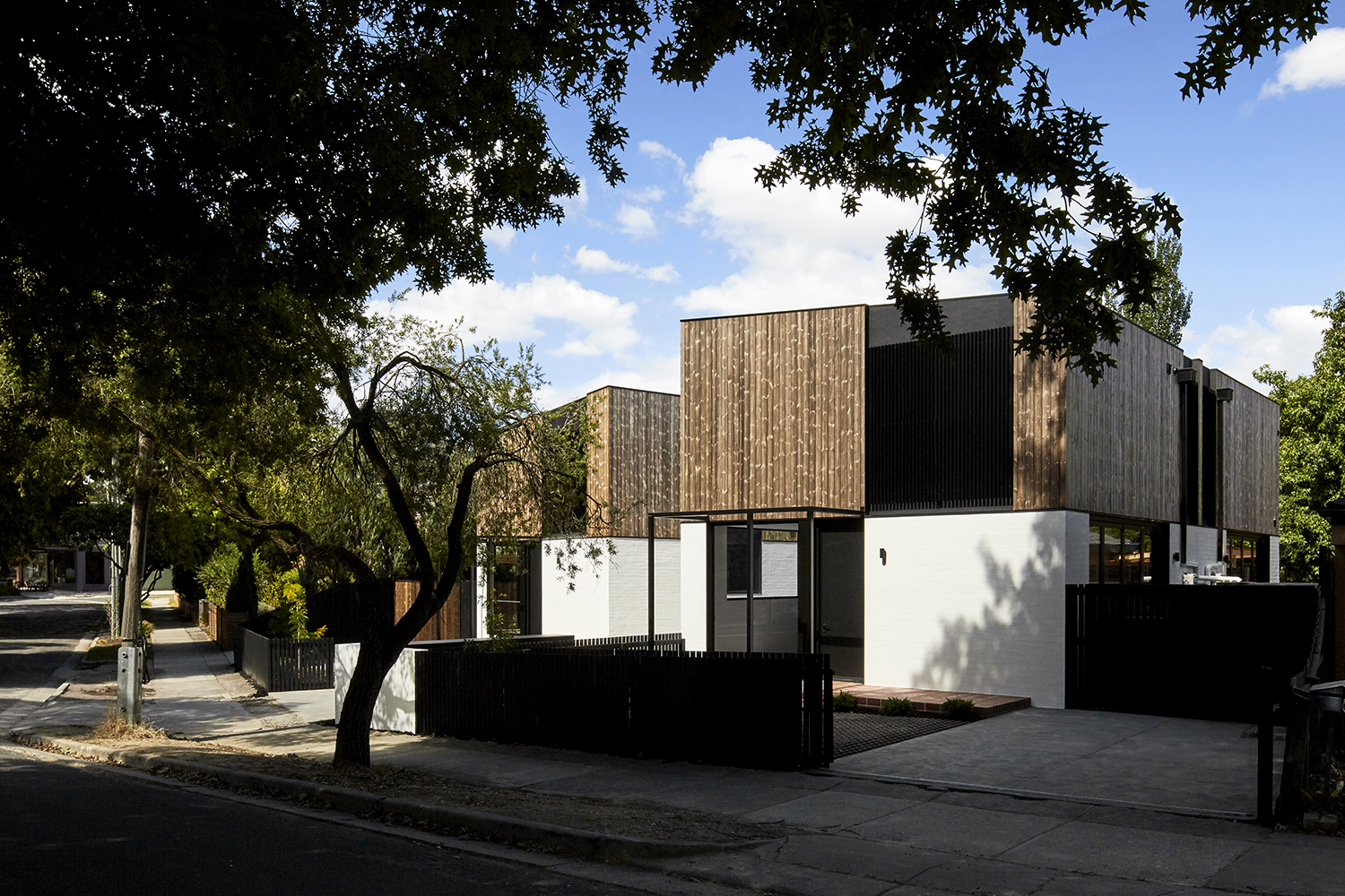 Increasing The 50 Square Metre Units By Extruding Upward Resulted In Six Near Identical 100 Square Metre Two Bedroom Townhouses On The Si