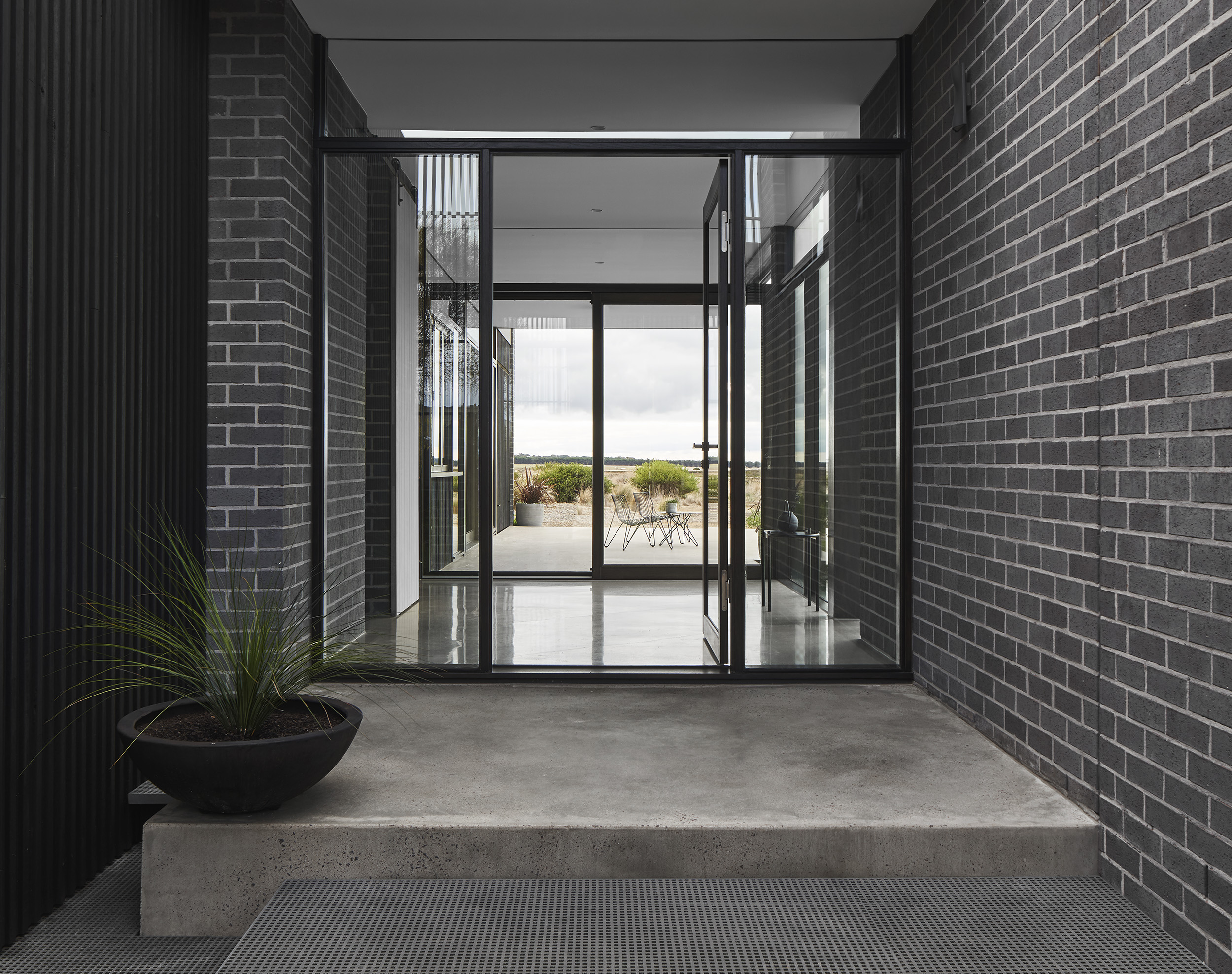 The Torquay House Is Oriented Toward The Views Across The Golf Course, With The Design Framed By Expanses Of Earth And