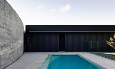 The Low Slung, Glazed Modernist Pavilion Is Clad In Metal, Similar To That Of A Rural Barn Or Shed.