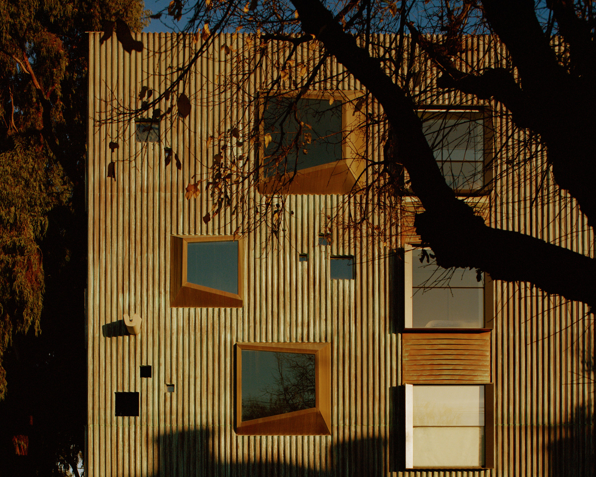 Together With The Textural Variation Of The Concrete And Bronze Tones