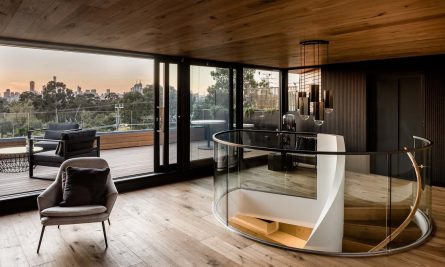 A Glimpse Of The Oak Stairs Provides A Subtle Hint As To What Lies Above