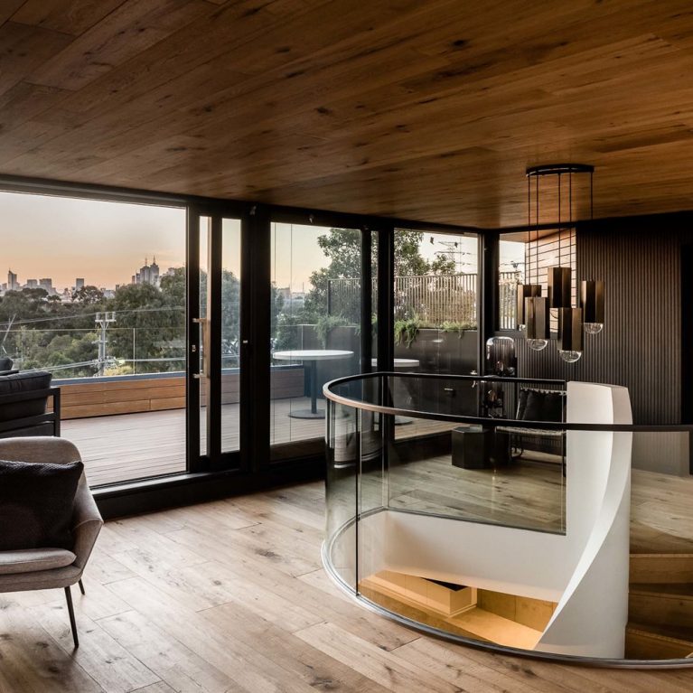 A Glimpse Of The Oak Stairs Provides A Subtle Hint As To What Lies Above