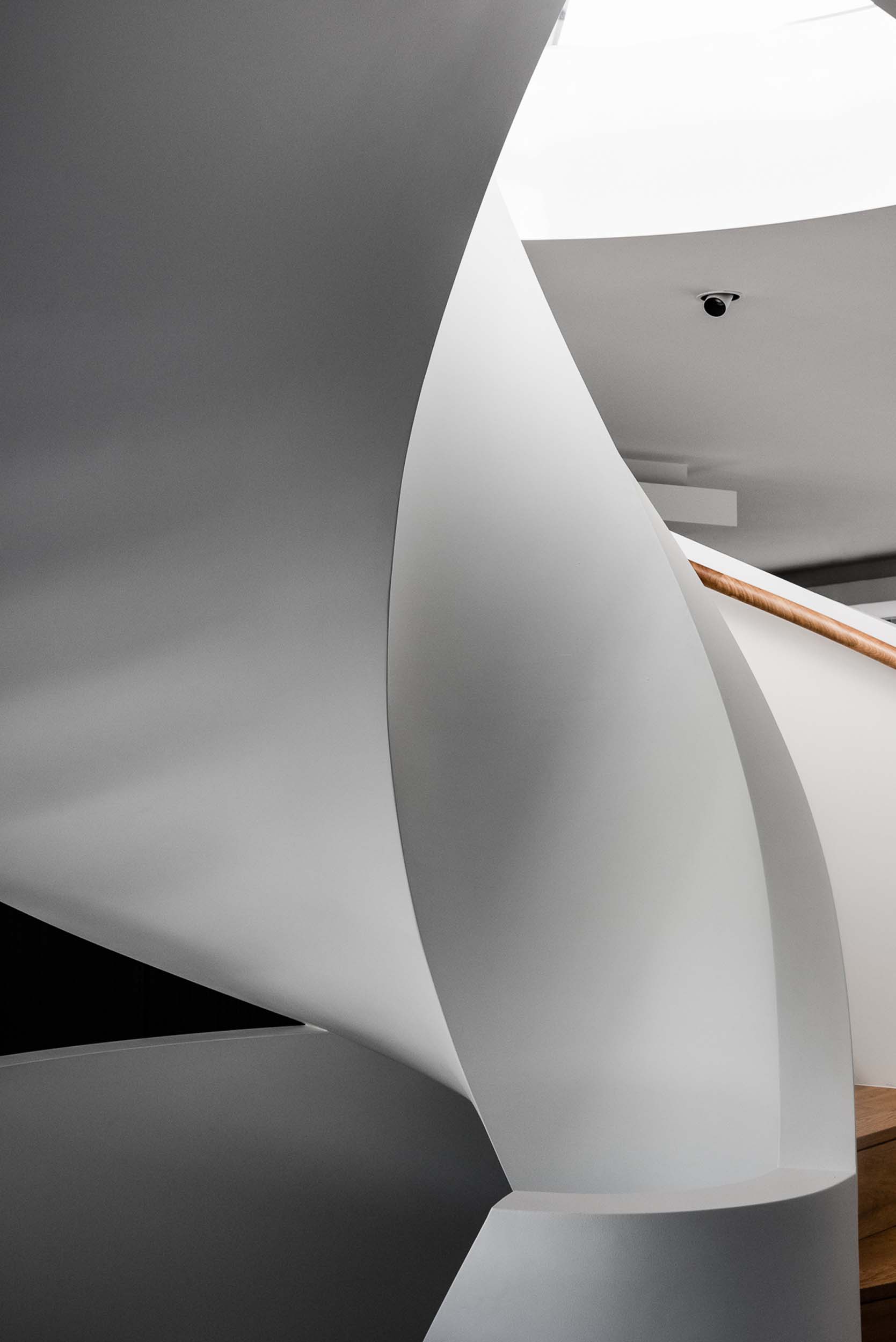 A Sculptural Spiral Stair Is A Feature Of The Architecture That Formed A Focal Point For The Interior Design.