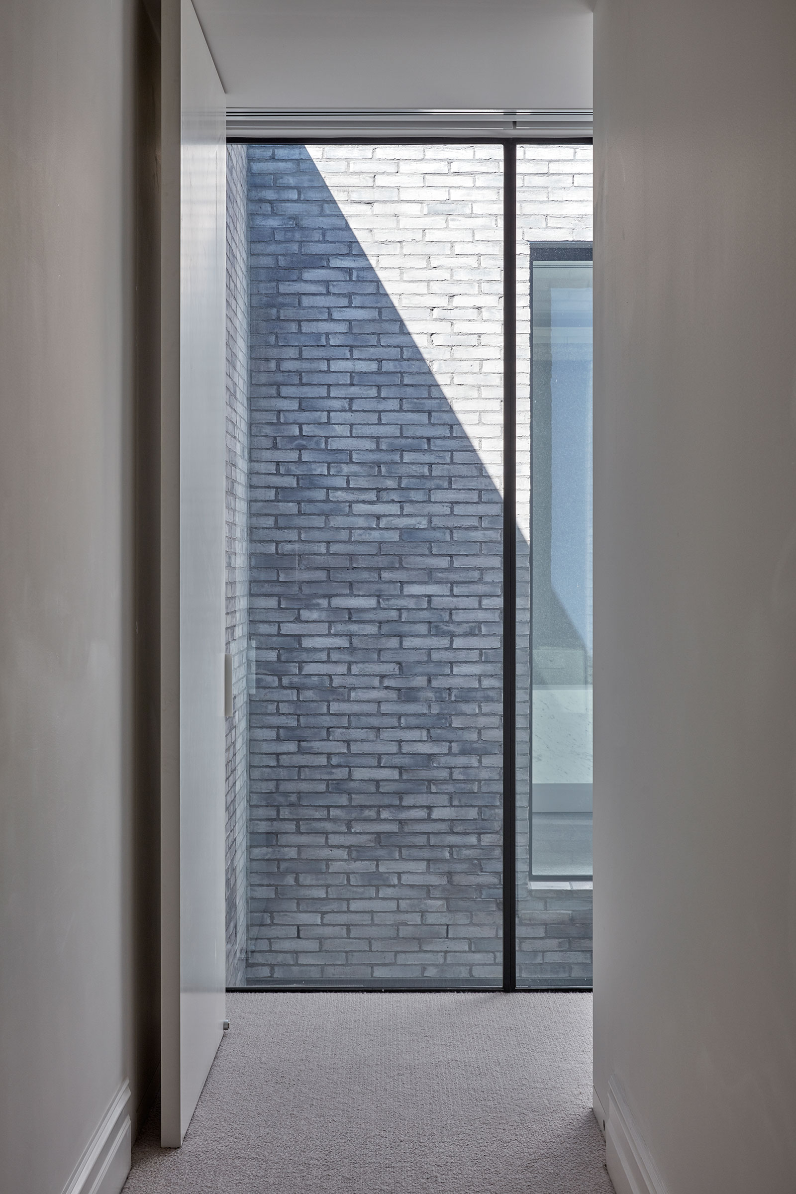 An Extension To An Existing Victorian Era Home Is Flooded With Light.