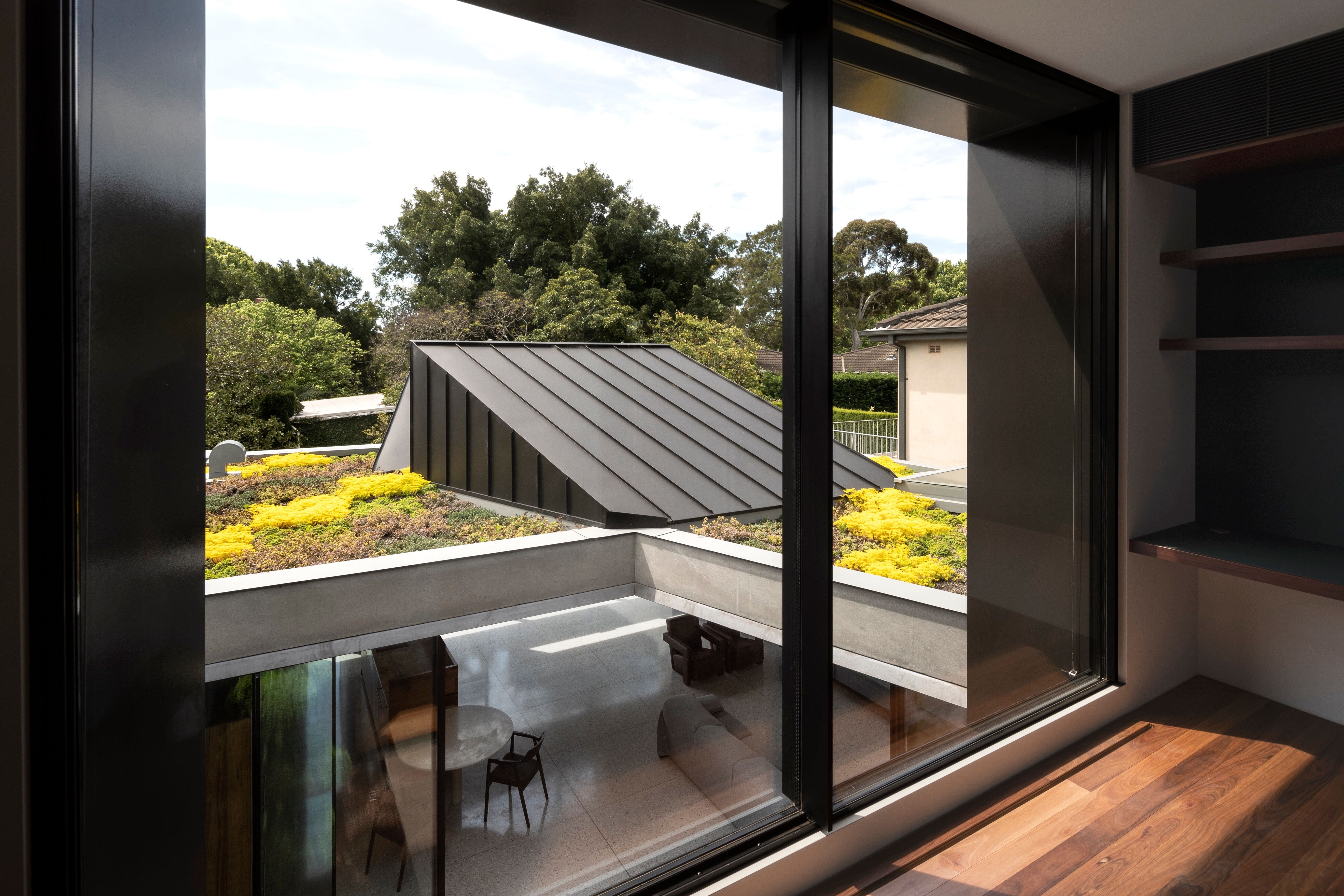 The Architectural Elements Of The New Building Are Clearly Defined Using Masonry, Concrete And Metal Cladding On