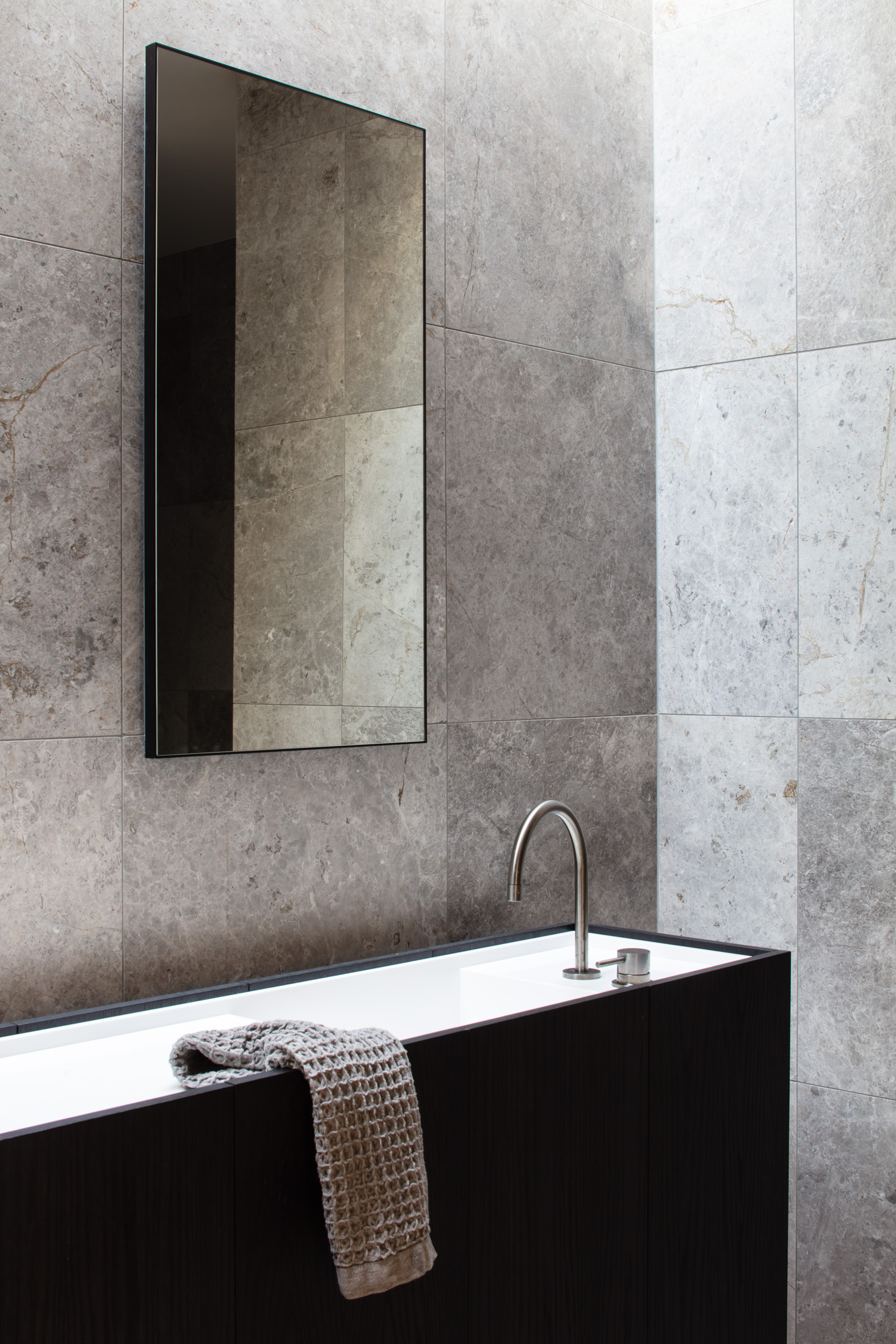 The Kitchen Is Made From Dark, Bespoke Oak Joinery With Porcelain Benchtop And Integrated Appliances Which Can Be Stored Away After Use.