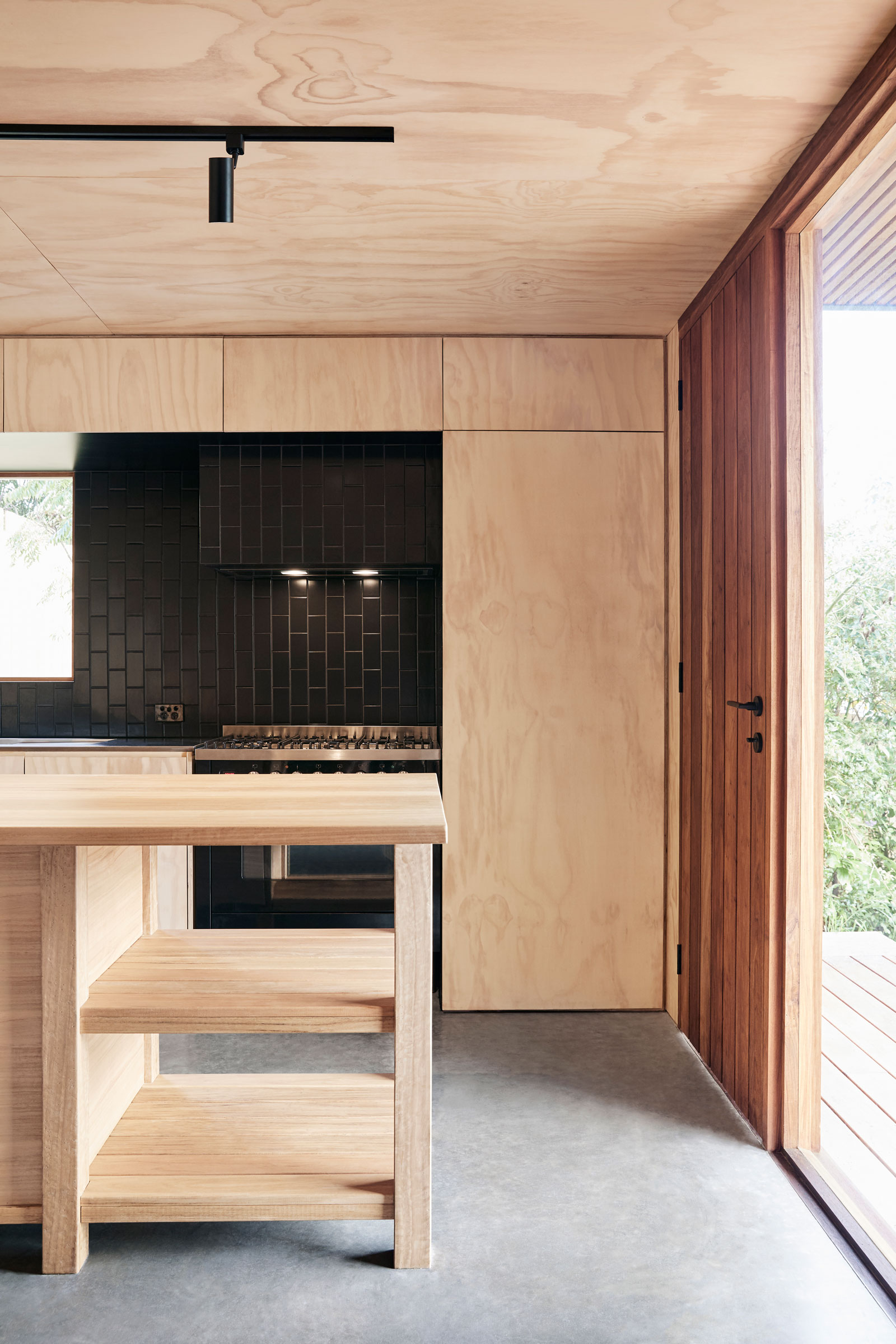 An Unassuming, Rectilinear Expression Sits East West Across The Rear Of A Large Site In Byron Bay.